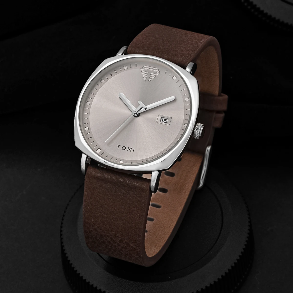 TOMI Watch - Silver case brown strap on display stand